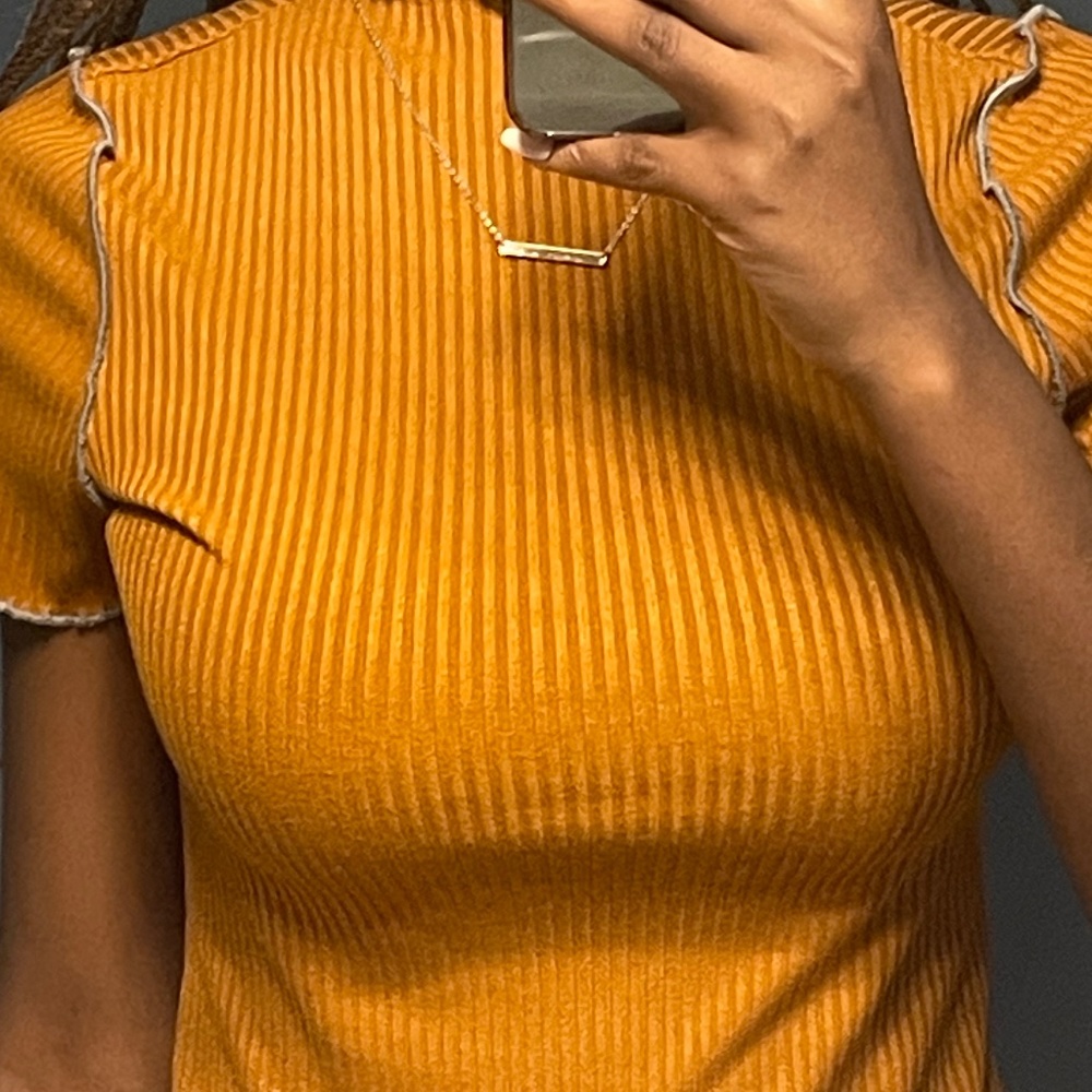 tan mock-neck t-shirt